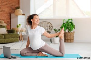 pregnant woman practicing yoga